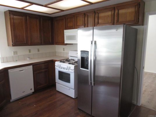 Interior, Kitchen, Tile Countertops, Wood Texture Flooring