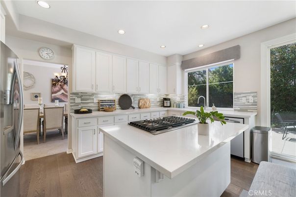 Dining room, Interior, Kitchen, Recessed Lighting, Stainless Steel Appliances, Wood Texture Flooring