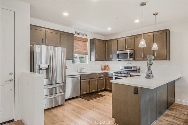 Interior, Kitchen, Pendant Lights, Recessed Lighting, Stainless Steel Appliances, Wood Texture Flooring
