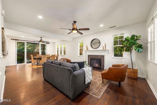 Dining room, Fireplace, Interior, Living room, Recessed Lighting, Wood Texture Flooring