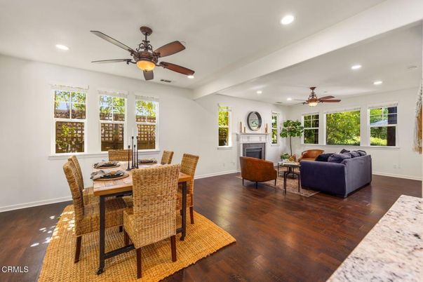 Dining room, Fireplace, Interior, Living room, Recessed Lighting, Wood Texture Flooring