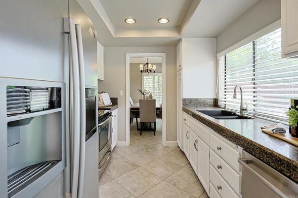 Chandelier, Dining room, Interior, Kitchen, Recessed Lighting, Stainless Steel Appliances