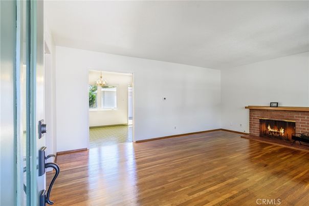 Chandelier, Empty room, Fireplace, Interior, Wood Texture Flooring