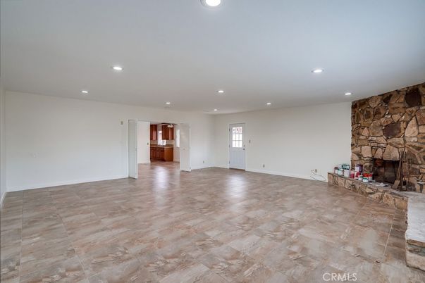 Empty room, Fireplace, Interior, Recessed Lighting, Stone Walls