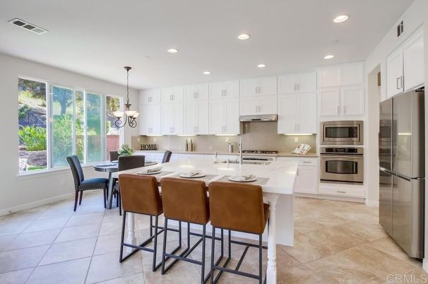 Chandelier, Dining room, Interior, Kitchen, Pendant Lights, Recessed Lighting, Stainless Steel Appliances