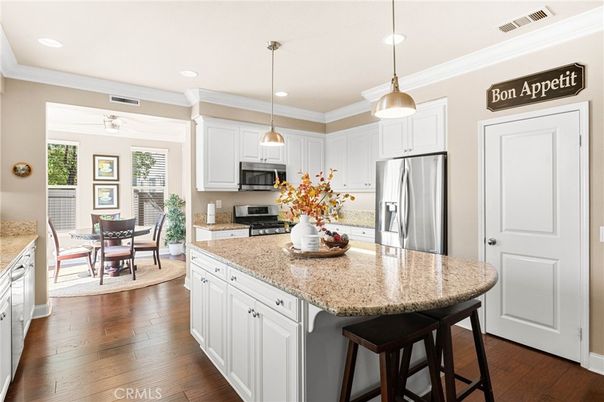Dining room, Interior, Kitchen, Pendant Lights, Recessed Lighting, Stainless Steel Appliances, Wood Texture Flooring