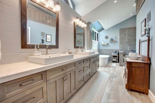 Bathroom, Dual Sink Vanities, Free Standing Baths, Interior, Recessed Lighting, Wood Texture Flooring