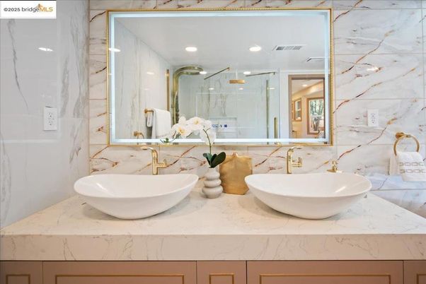 Bathroom, Dual Sink Vanities, Glass Shower, Interior, Marble Walls, Recessed Lighting