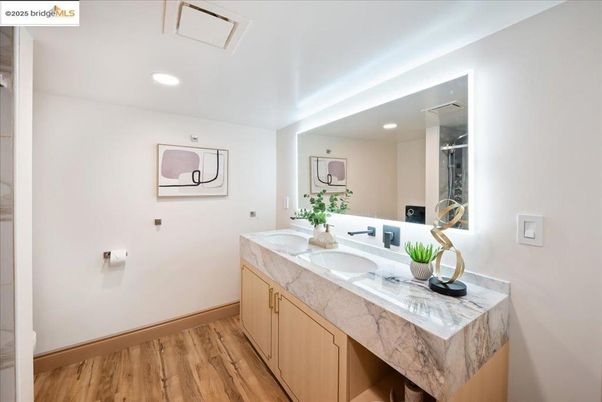 Bathroom, Dual Sink Vanities, Interior, Recessed Lighting, Wood Texture Flooring