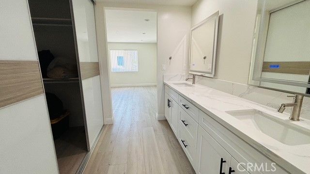 Bathroom, Dual Sink Vanities, Interior, Recessed Lighting, Wood Texture Flooring