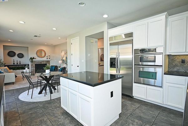 Dining room, Fireplace, Interior, Kitchen, Living room, Recessed Lighting, Stainless Steel Appliances