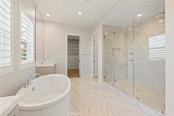 Bathroom, Dual Sink Vanities, Free Standing Baths, Glass Shower, Interior, Marble, Marble Walls, Recessed Lighting