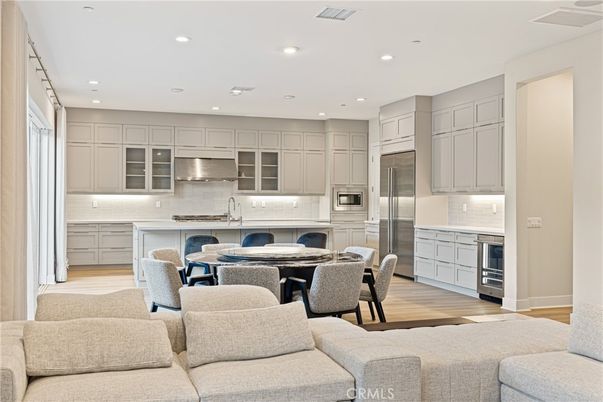 Dining room, Interior, Kitchen, Recessed Lighting, Stainless Steel Appliances, Wood Texture Flooring