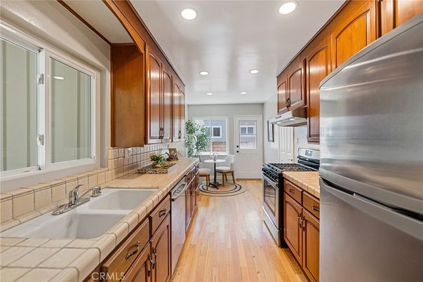 Dining room, Interior, Kitchen, Recessed Lighting, Tile Countertops, Wood Texture Flooring