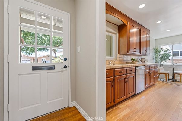 Interior, Kitchen, Recessed Lighting, Tile Countertops, Wood Texture Flooring