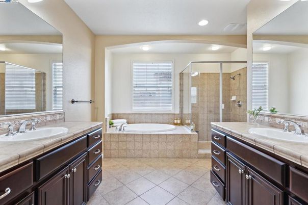 Bathroom, Dual Sink Vanities, Glass Shower, Interior, Recessed Lighting, Tile Countertops