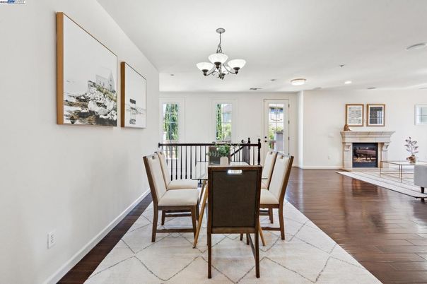 Chandelier, Dining room, Fireplace, Interior, Recessed Lighting, Wood Texture Flooring