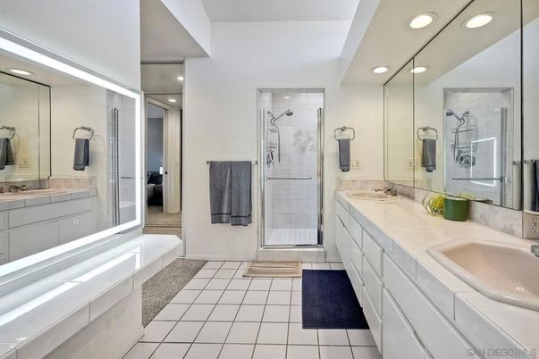 Bathroom, Dual Sink Vanities, Glass Shower, Interior, Recessed Lighting, Tile Countertops