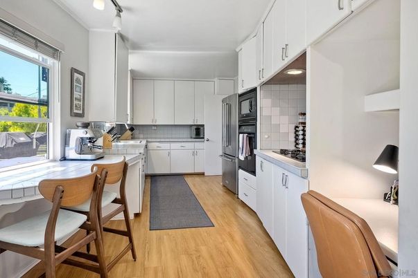 Interior, Kitchen, Tile Countertops, Wood Texture Flooring