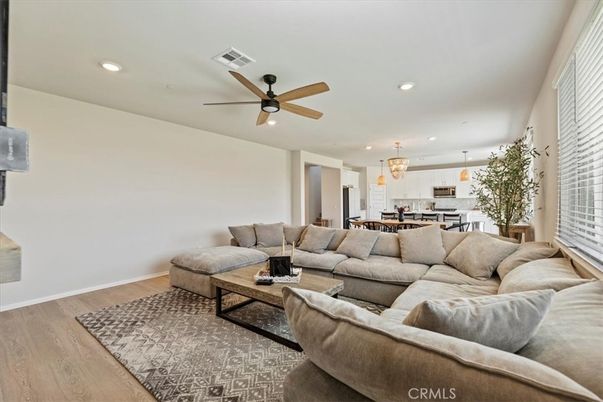 Dining room, Interior, Kitchen, Living room, Pendant Lights, Recessed Lighting, Stainless Steel Appliances, Wood Texture Flooring