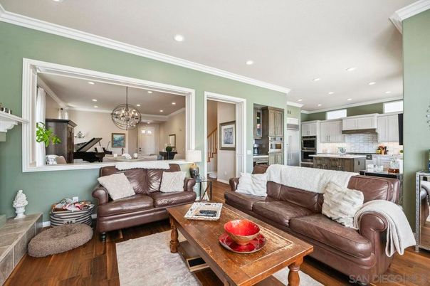 Chandelier, Dining room, Interior, Kitchen, Living room, Recessed Lighting, Stainless Steel Appliances, Wood Texture Flooring