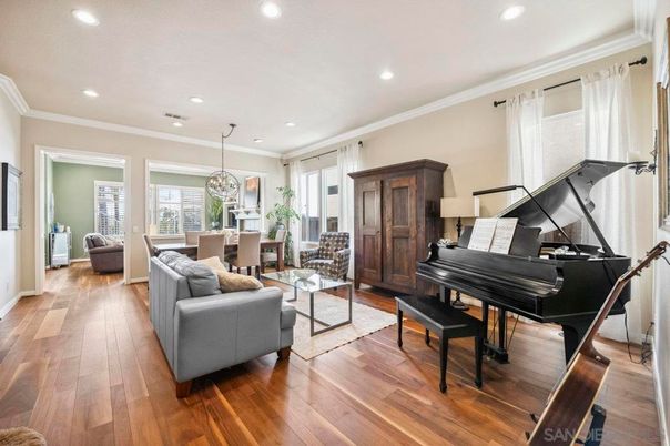 Chandelier, Dining room, Interior, Living room, Piano, Recessed Lighting, Wood Texture Flooring