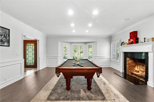 Billiard Table, Fireplace, Game Room, Interior, Recessed Lighting, Wood Texture Flooring