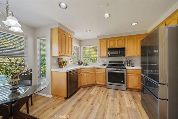 Dining room, Interior, Kitchen, Recessed Lighting, Stainless Steel Appliances, Wood Texture Flooring