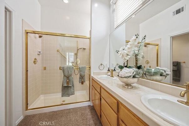 Bathroom, Dual Sink Vanities, Glass Shower, Interior, Recessed Lighting, Tile Countertops