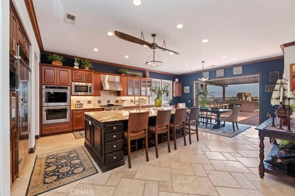 Chandelier, Dining room, Interior, Kitchen, Pendant Lights, Recessed Lighting, Stainless Steel Appliances