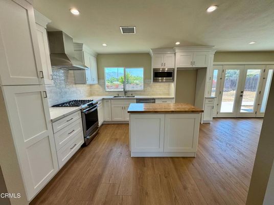 Interior, Kitchen, Recessed Lighting, Stainless Steel Appliances, Wood Texture Flooring