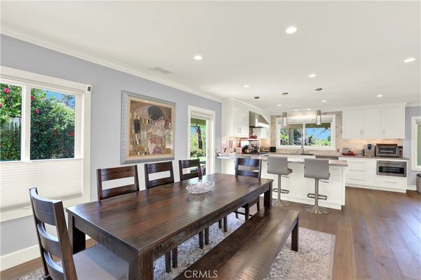 Dining room, Interior, Kitchen, Pendant Lights, Recessed Lighting, Stainless Steel Appliances, Wood Texture Flooring