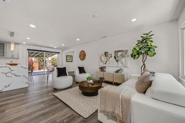Interior, Living room, Marble Walls, Pendant Lights, Recessed Lighting, Wood Texture Flooring