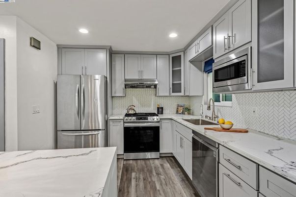 Interior, Kitchen, Recessed Lighting, Stainless Steel Appliances, Wood Texture Flooring