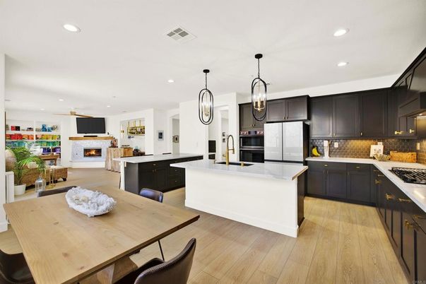 Fireplace, Interior, Kitchen, Pendant Lights, Recessed Lighting, Stainless Steel Appliances, Wood Texture Flooring