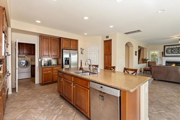Fireplace, Interior, Kitchen, Living room, Recessed Lighting, Stainless Steel Appliances, Washer
