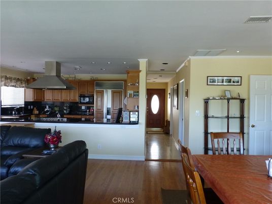 Dining room, Interior, Kitchen, Recessed Lighting, Stainless Steel Appliances, Wood Texture Flooring