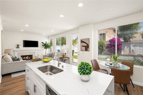 Dining room, Fireplace, Interior, Kitchen, Living room, Recessed Lighting, Wood Texture Flooring
