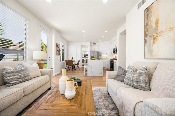 Dining room, Interior, Kitchen, Living room, Recessed Lighting, Stainless Steel Appliances, Wood Texture Flooring