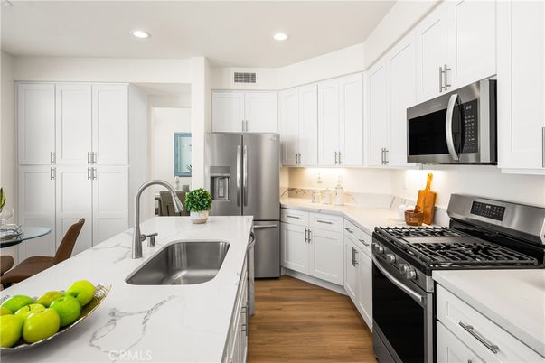 Interior, Kitchen, Recessed Lighting, Stainless Steel Appliances, Wood Texture Flooring