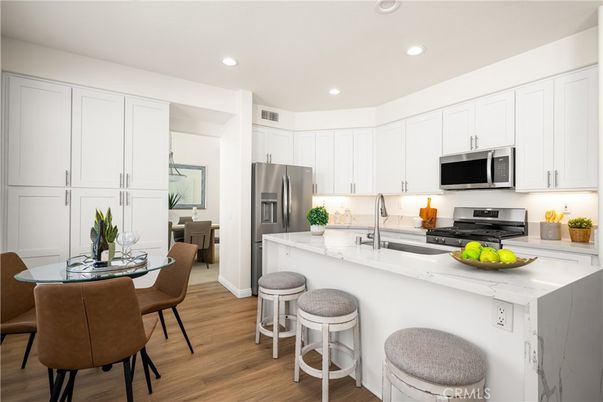Dining room, Interior, Kitchen, Recessed Lighting, Stainless Steel Appliances, Wood Texture Flooring