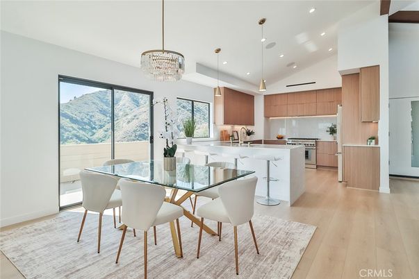 Chandelier, Dining room, Interior, Kitchen, Pendant Lights, Recessed Lighting, Stainless Steel Appliances, Wood Texture Flooring