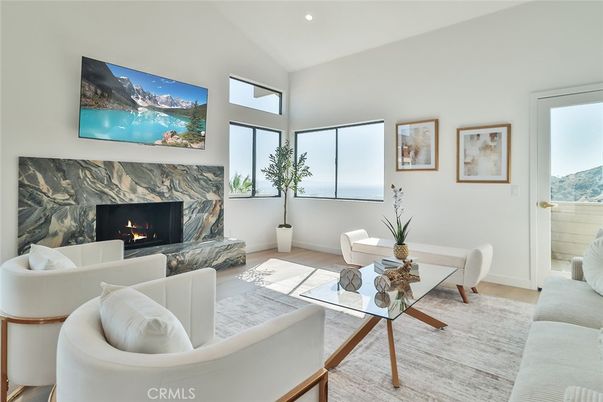 Dining room, Fireplace, Interior, Living room, Recessed Lighting, Wood Texture Flooring