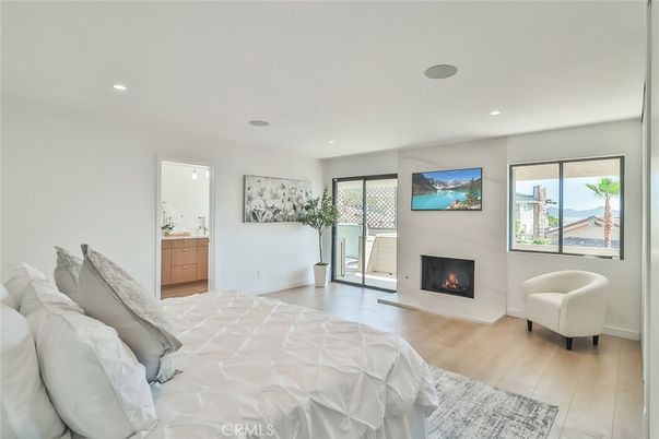 Bedroom, Fireplace, Interior, Recessed Lighting, Wood Texture Flooring