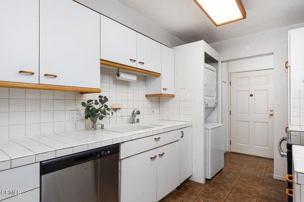 Interior, Kitchen, Tile Countertops, Washer