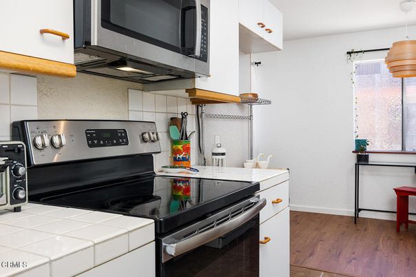 Interior, Kitchen, Tile Countertops, Wood Texture Flooring