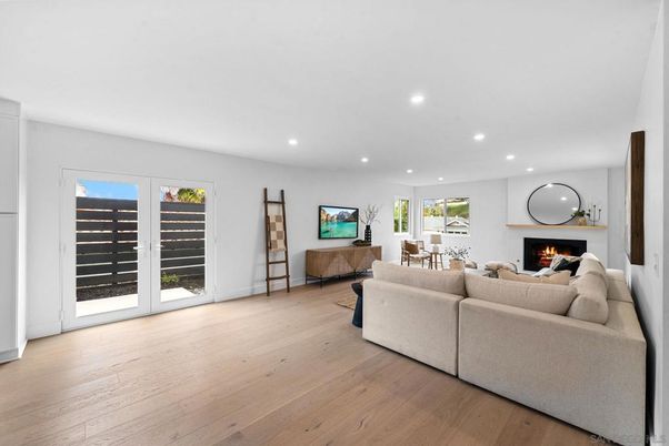 Dining room, Fireplace, Interior, Living room, Recessed Lighting, Wood Texture Flooring