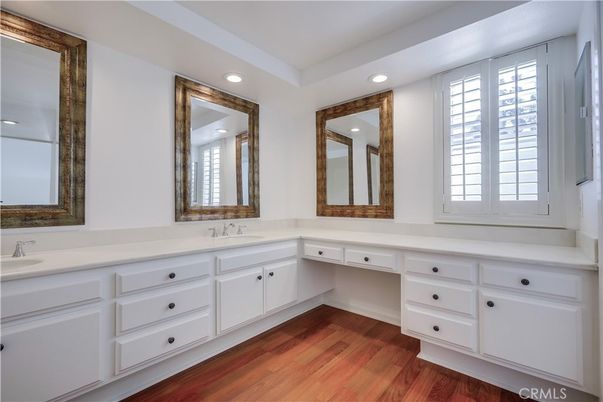 Bathroom, Dual Sink Vanities, Interior, Recessed Lighting, Wood Texture Flooring