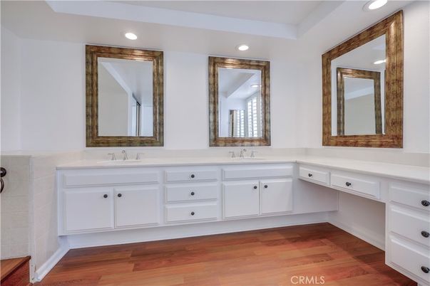 Bathroom, Dual Sink Vanities, Interior, Recessed Lighting, Wood Texture Flooring