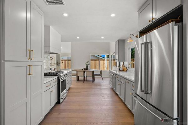 Dining room, Interior, Kitchen, Recessed Lighting, Stainless Steel Appliances, Wood Texture Flooring